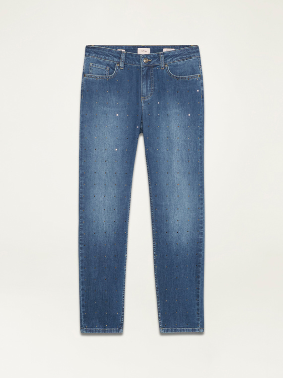 Jeans skinny con borchie applicate