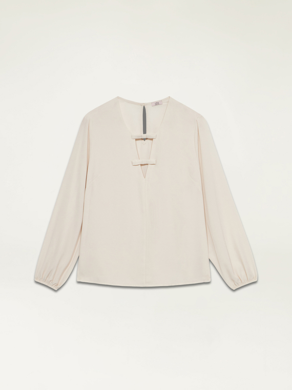 Blusa con dettaglio fiocchi