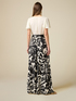 Long dress with patterned skirt image number 1