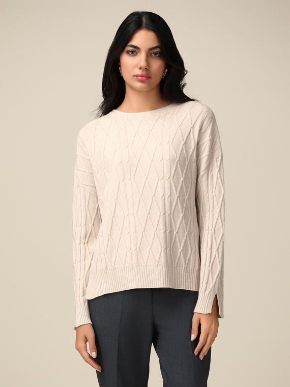 Boxy sweater with cabling pattern